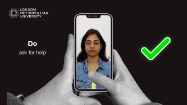 A photo of a student, indise a cartoon phone, being held by someones hands with a green tick on the right.