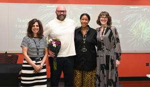 Chris Morris-Roberts receiving his award from university colleagues.